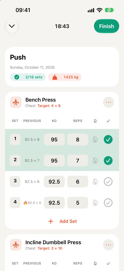 Live workout screen with sets, weights and reps
